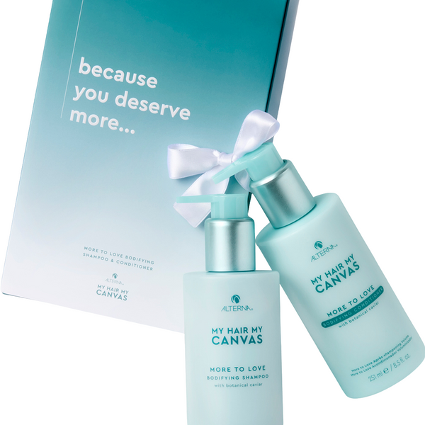 Two bottles of Alterna hair care products with a box labeled 'because you deserve more' on a white background.